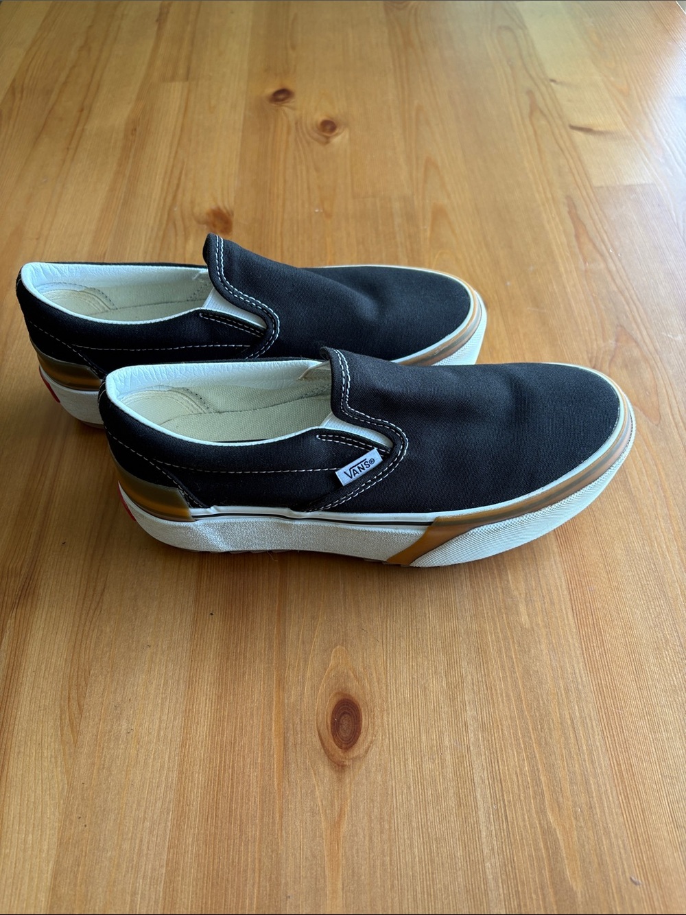 Vans Black Canvas Slip-On with stacked heel
